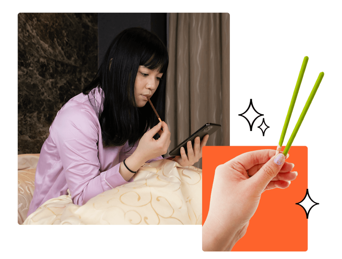 A woman eating Pocky.